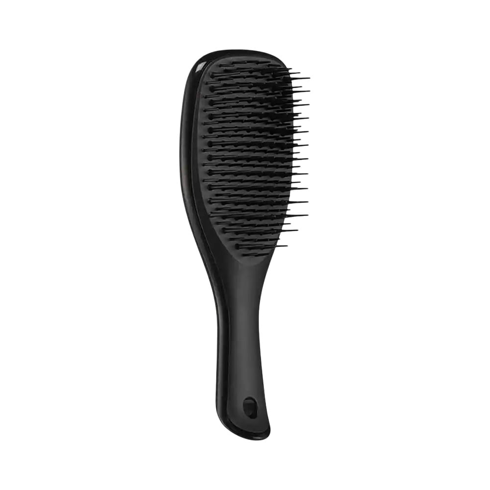 Escova Tangle Teezer The Ultimate Detangler preta vista em ângulo lateral mostrando dentes flexíveis e cabo ergonômico